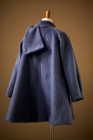 light blue girls coat with bow
