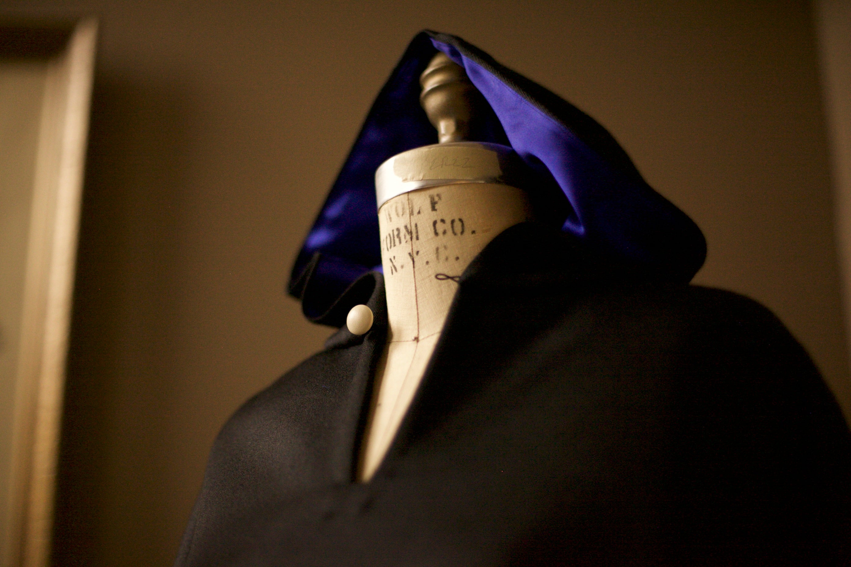 black cape with blue lining