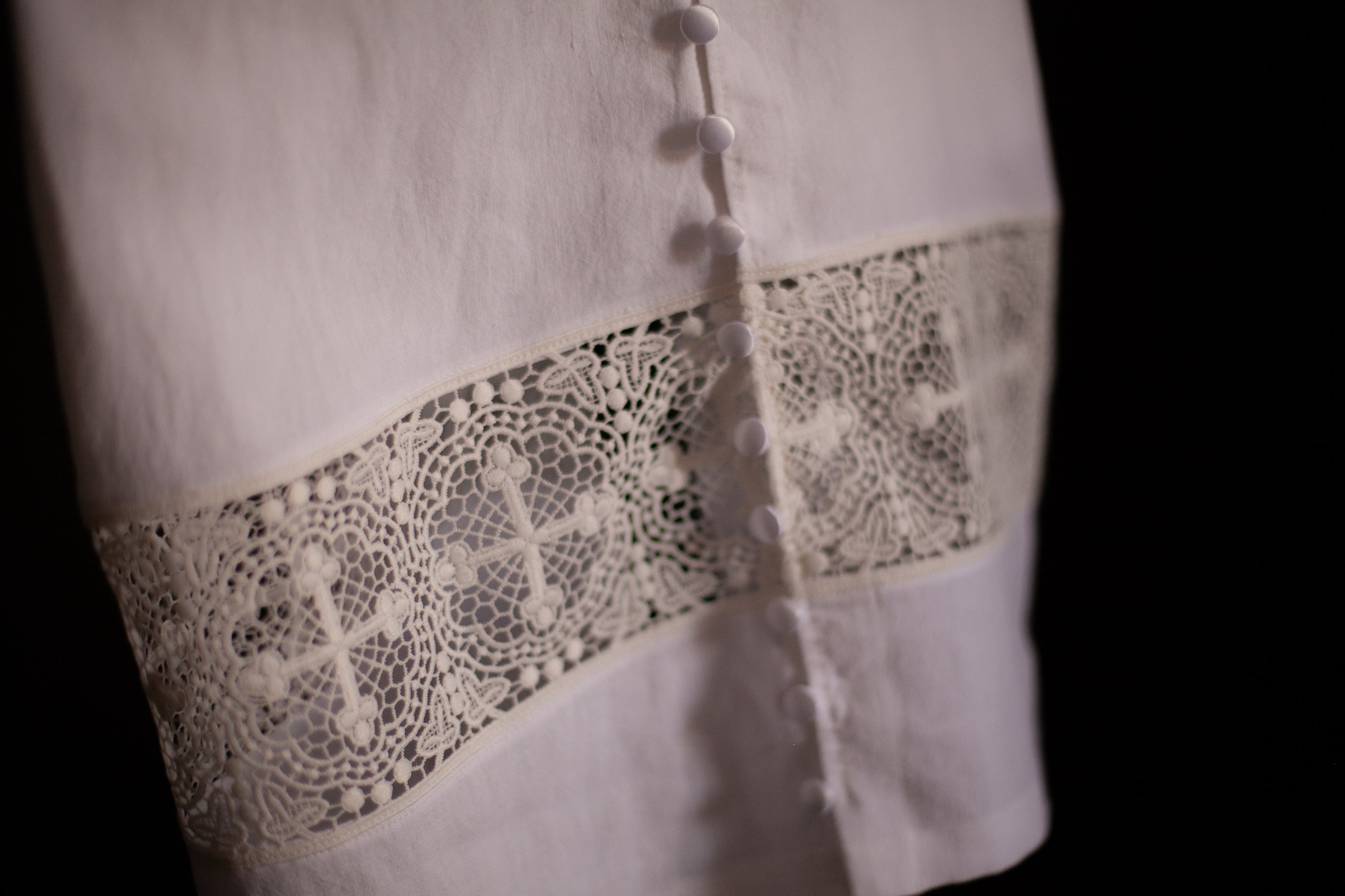 cross lace christening gown