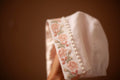 matching christening bonnet