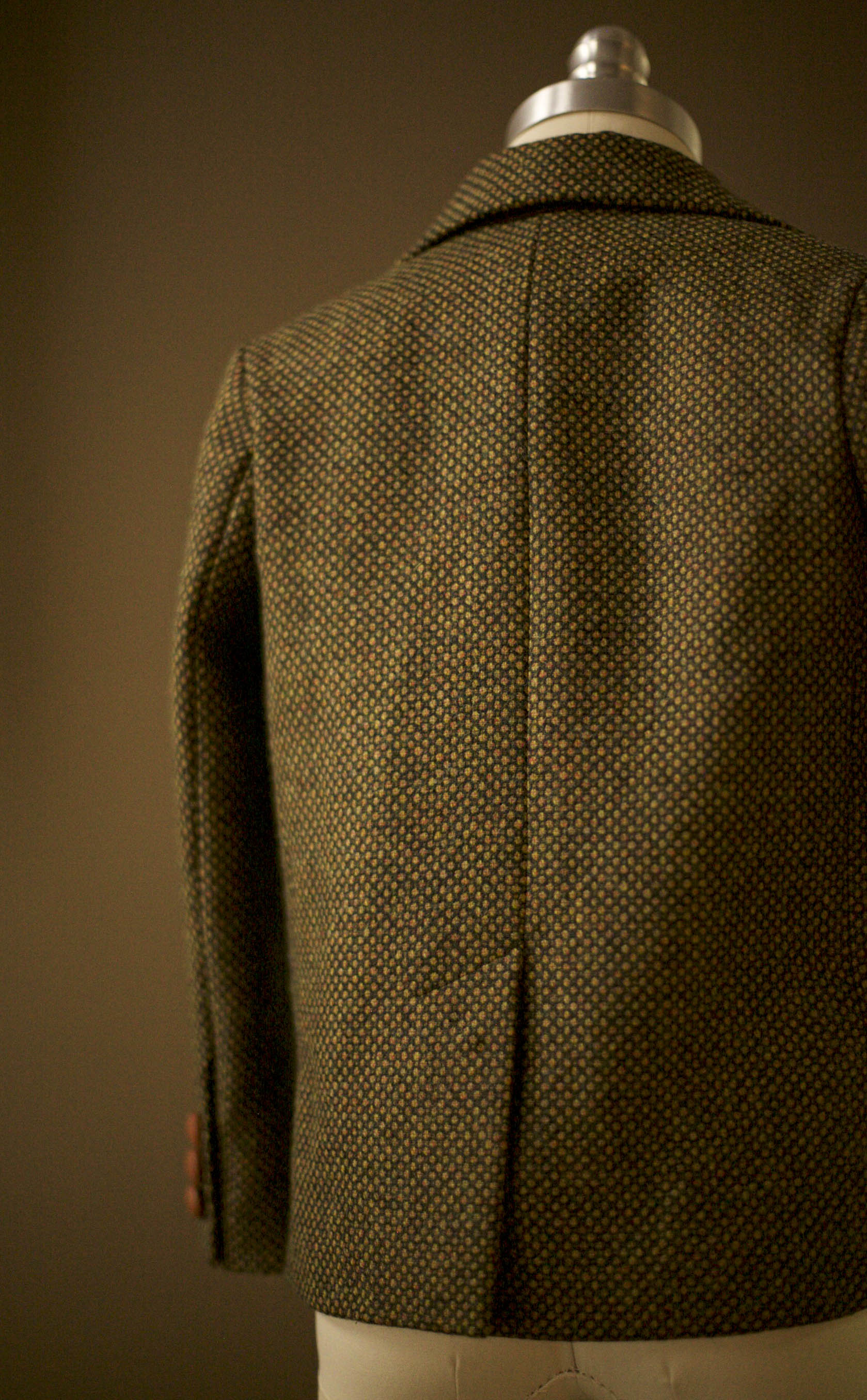 green and brown tweed jacket