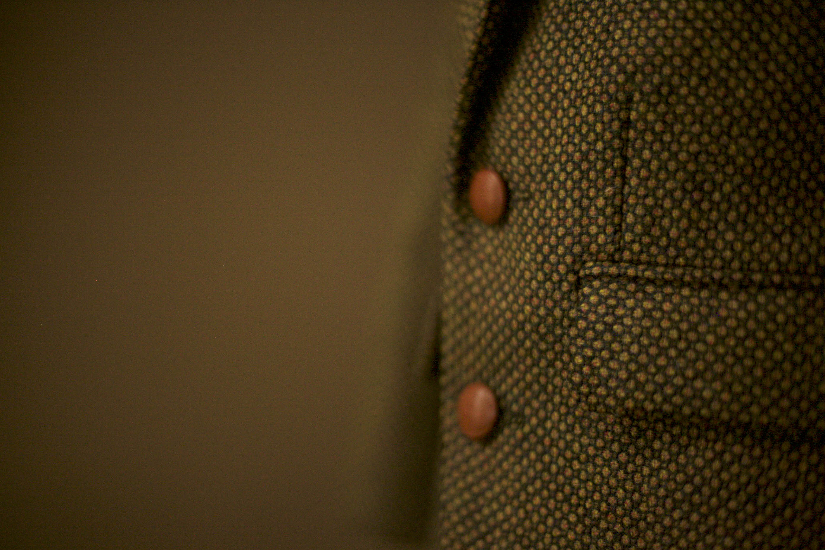 green tweed jacket