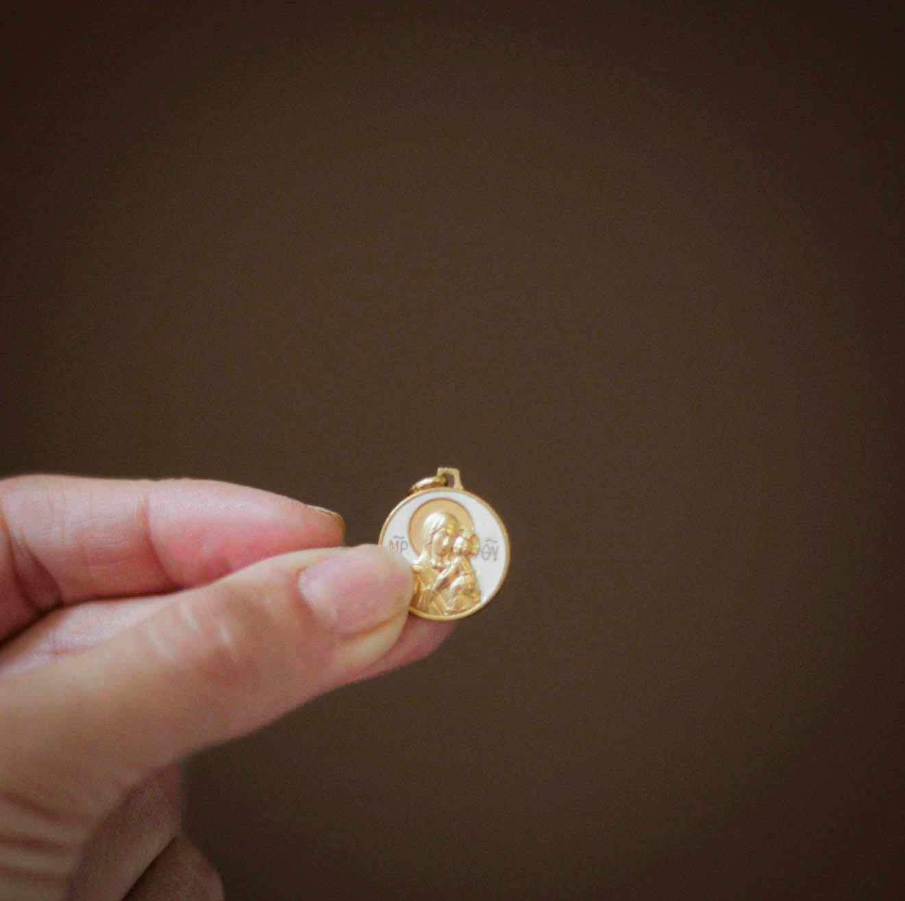 cream Virgin Mary holy medal
