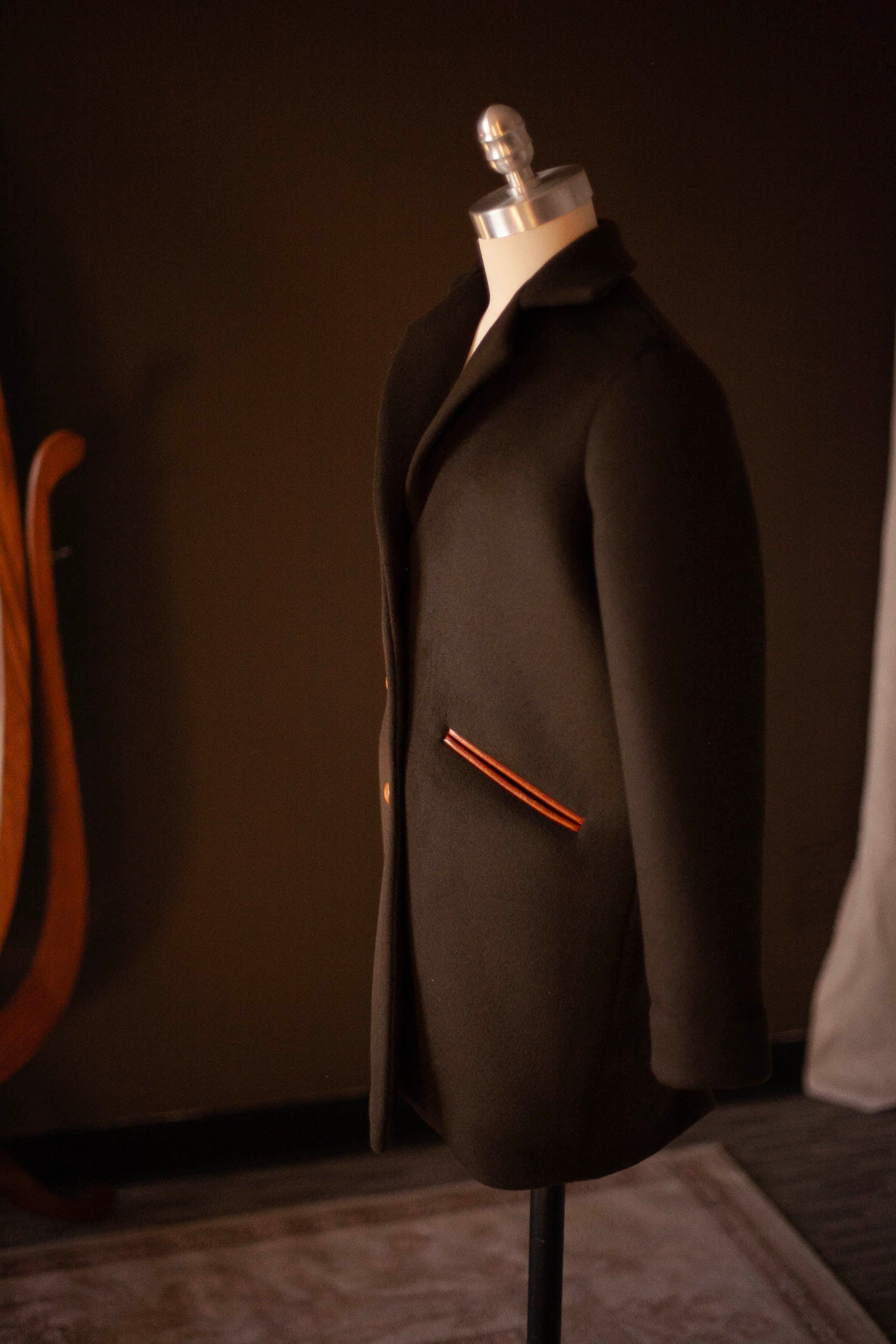 dark green wool coat with leather