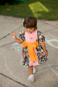 Handmade girls cotton dress with kitty cat print and orange polka-dot bow — Anagrassia Atelier