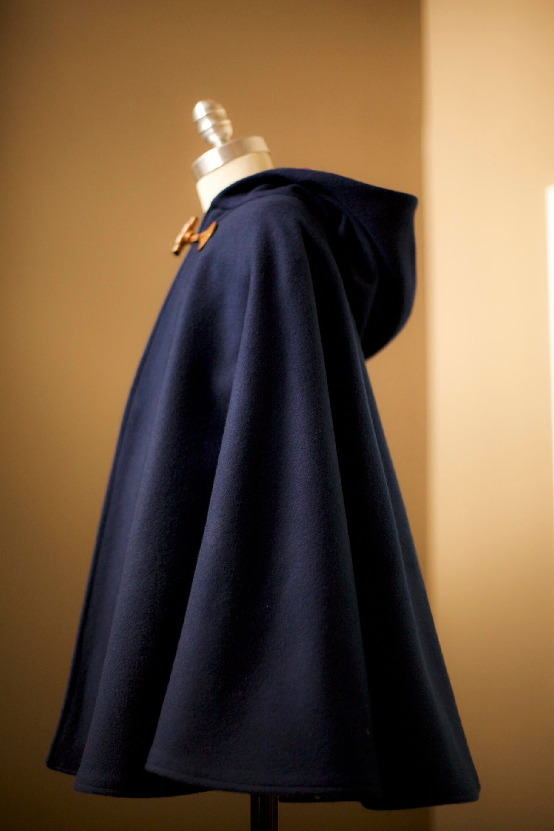 wool cape with leather
