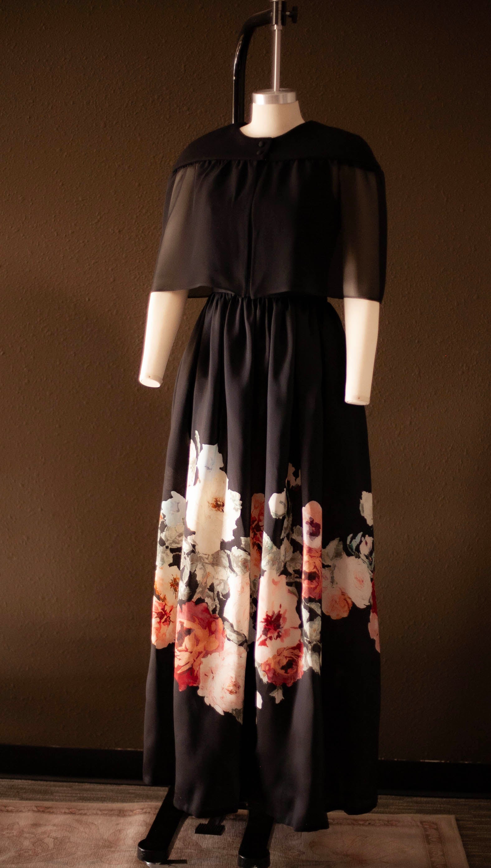 tailored black wool and silk cape