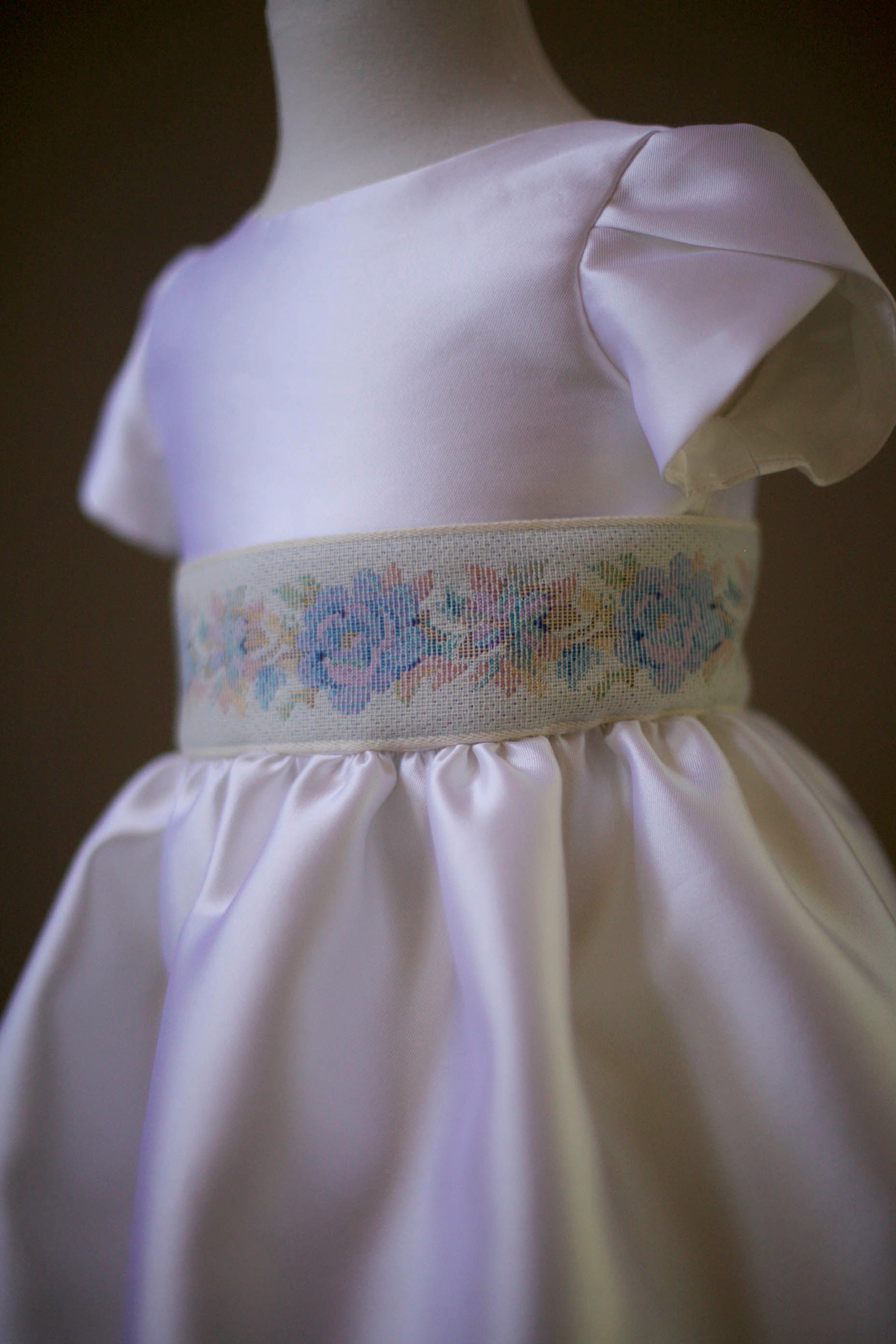 silk communion dress with embroidered sash
