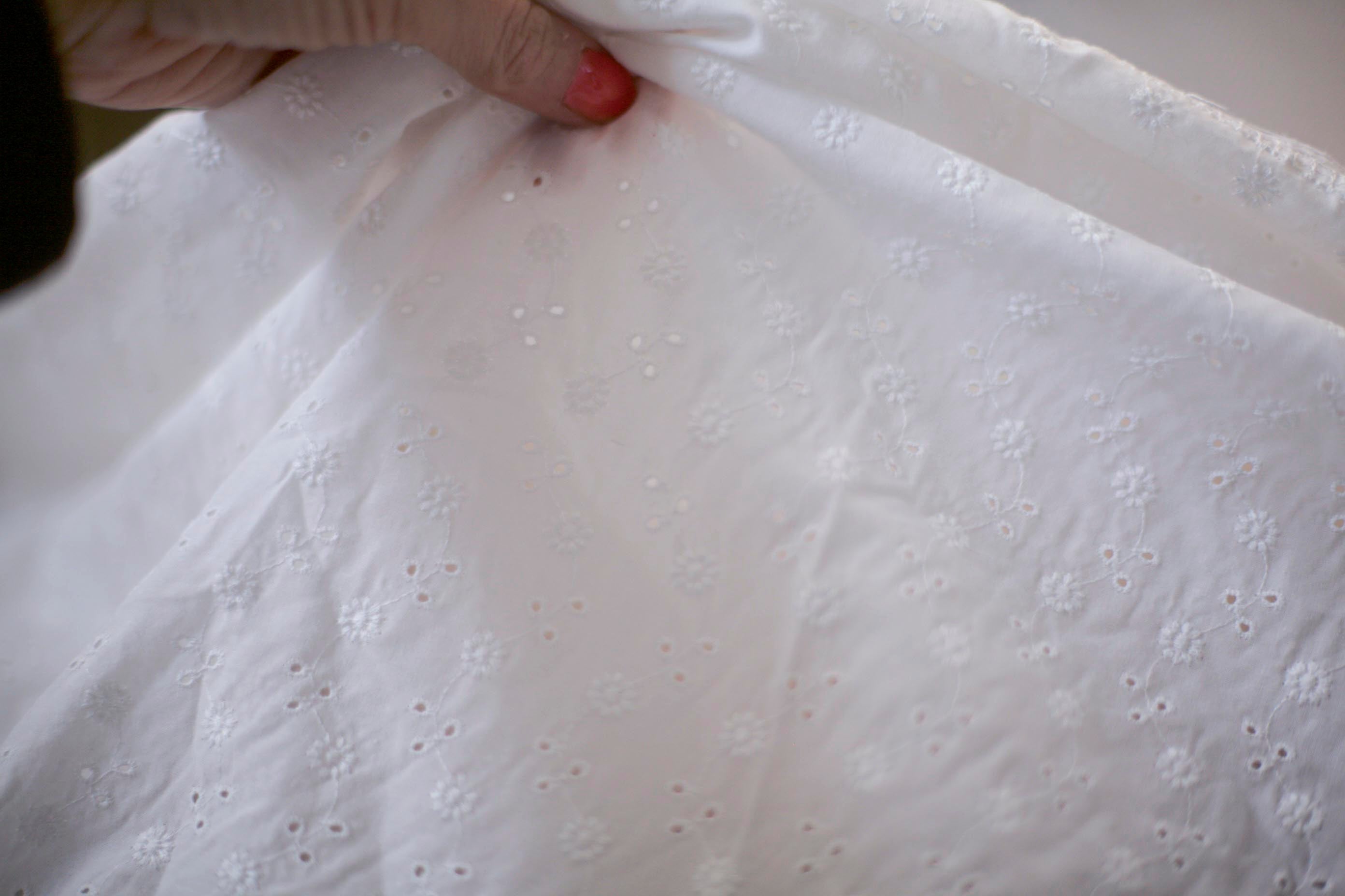 white floral eyelet fabric