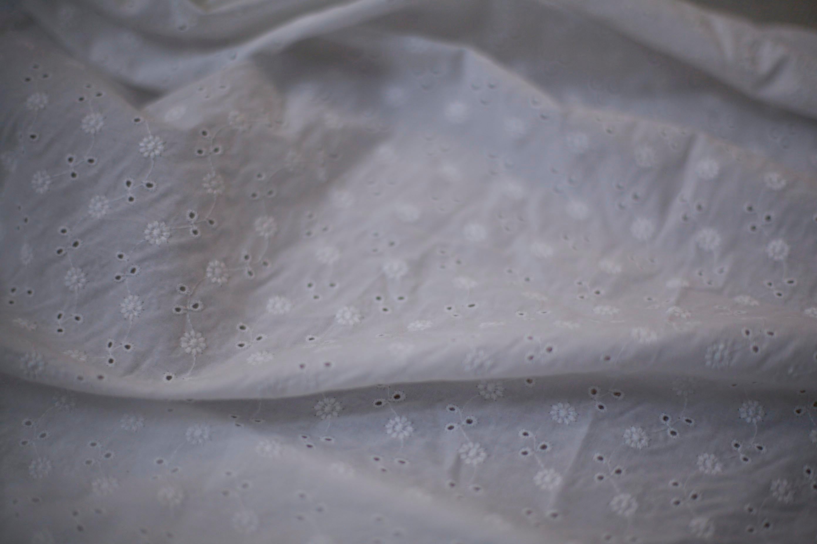 white cotton floral fabric eyelet