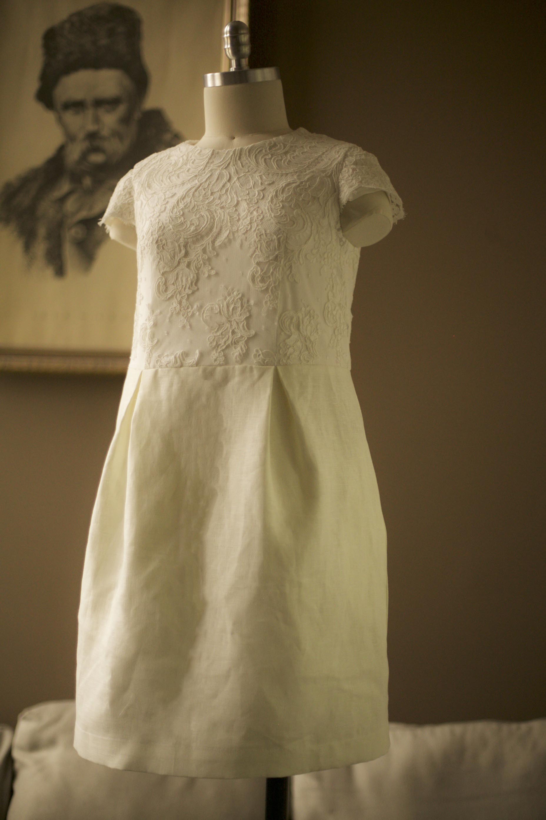 white lace and linen wedding dress