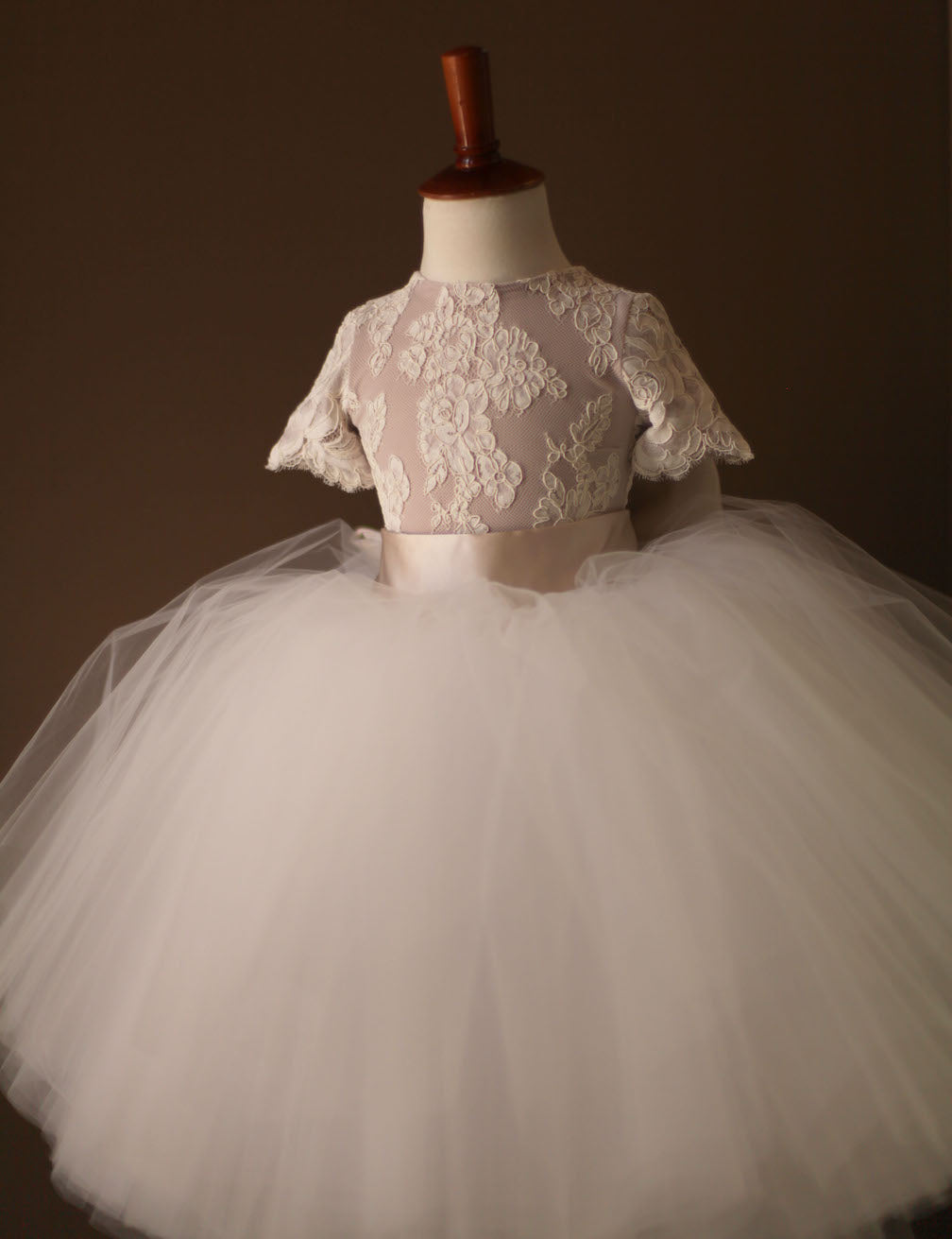 white flower girl dress with champagne sash