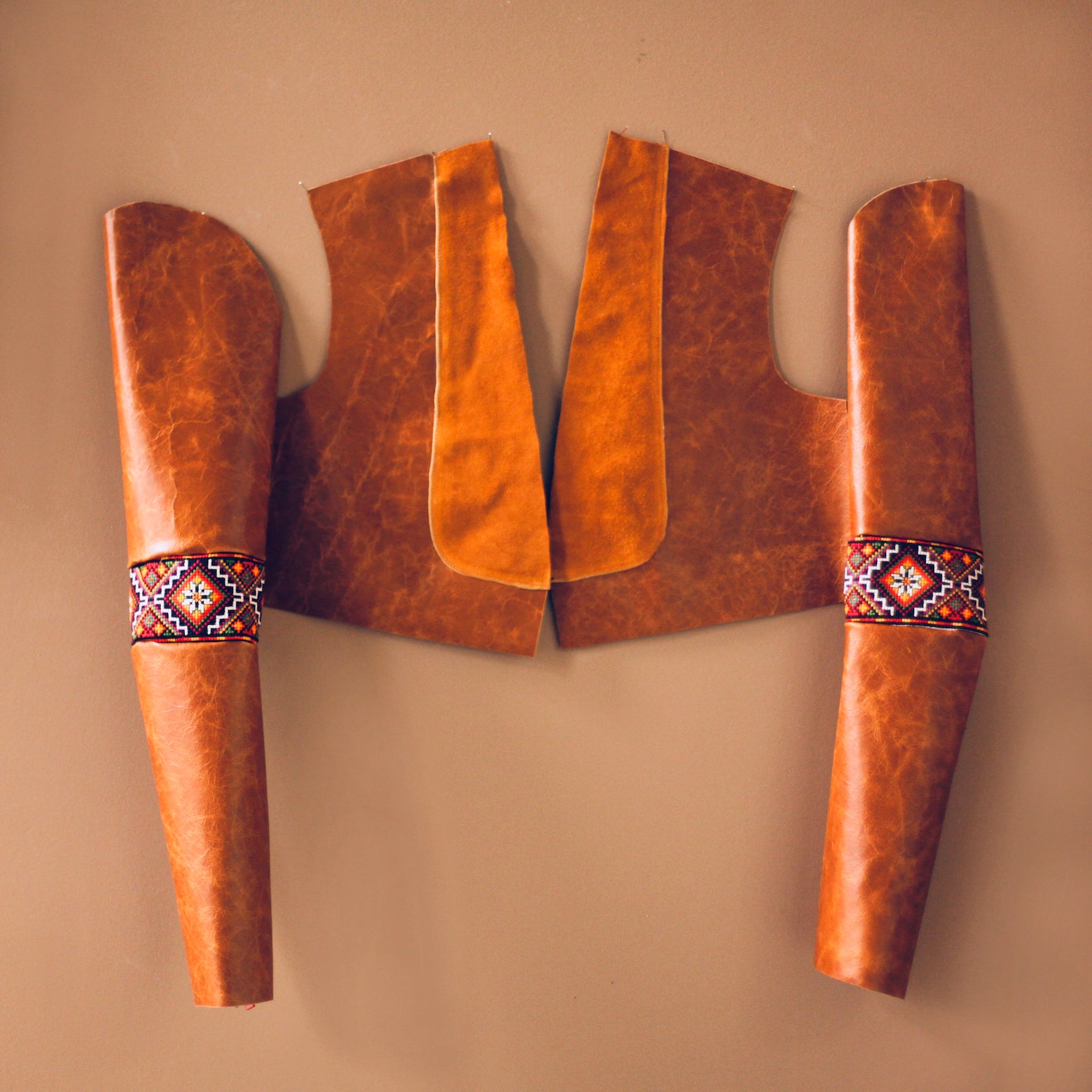 cognac hand embroidered leather jacket