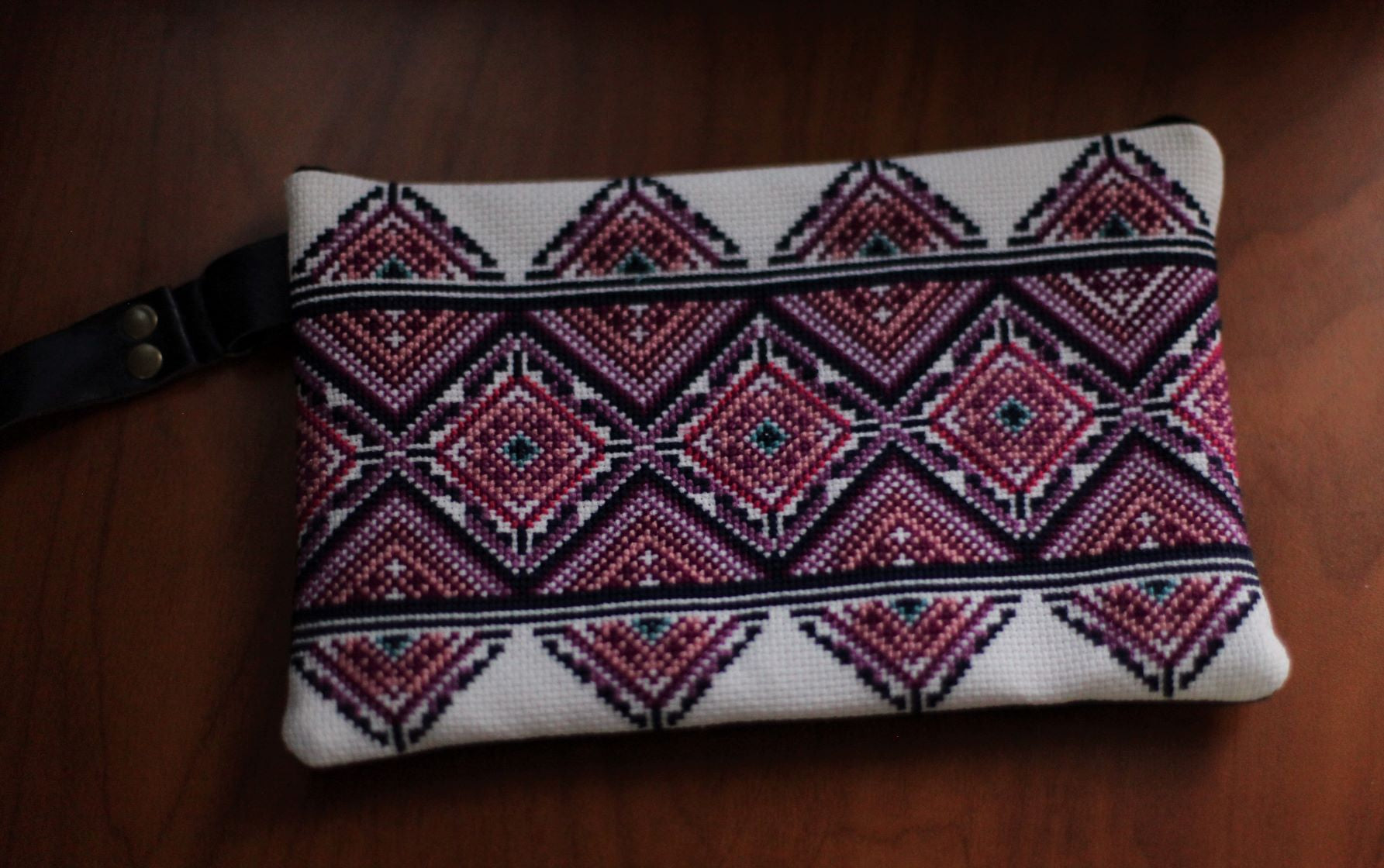 Hand embroidered leather handbag