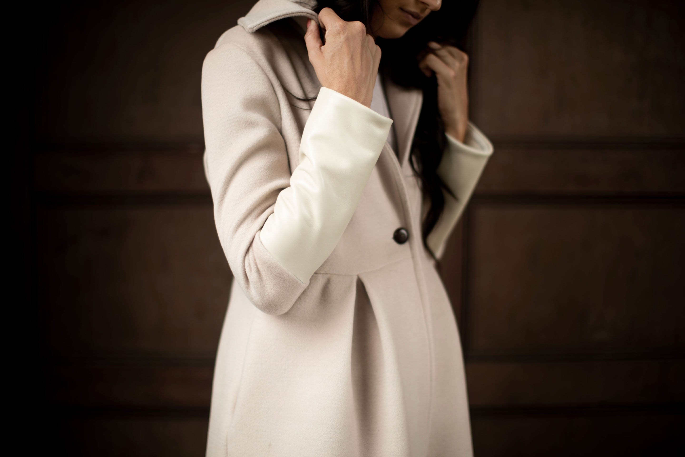 white leather wool coat