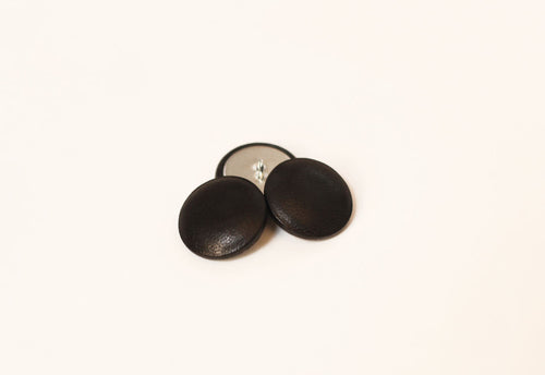 black leather buttons