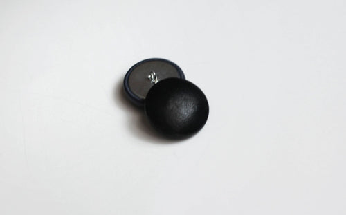 black leather buttons