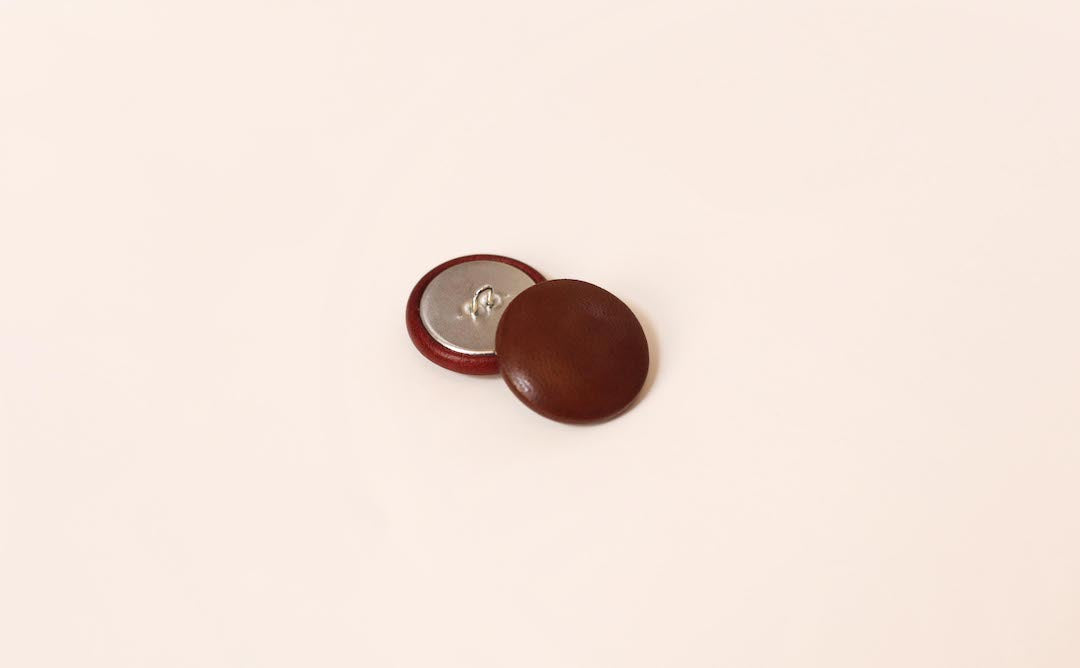 dark brown leather buttons