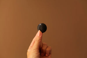 black leather buttons