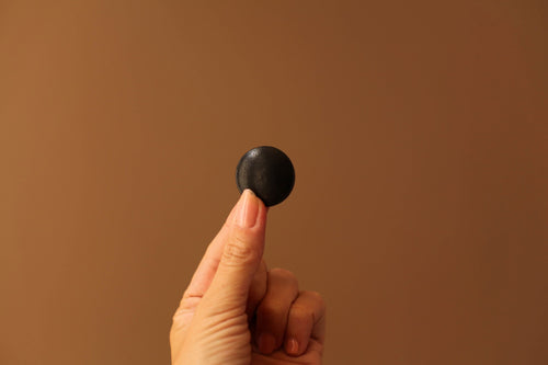 black leather buttons