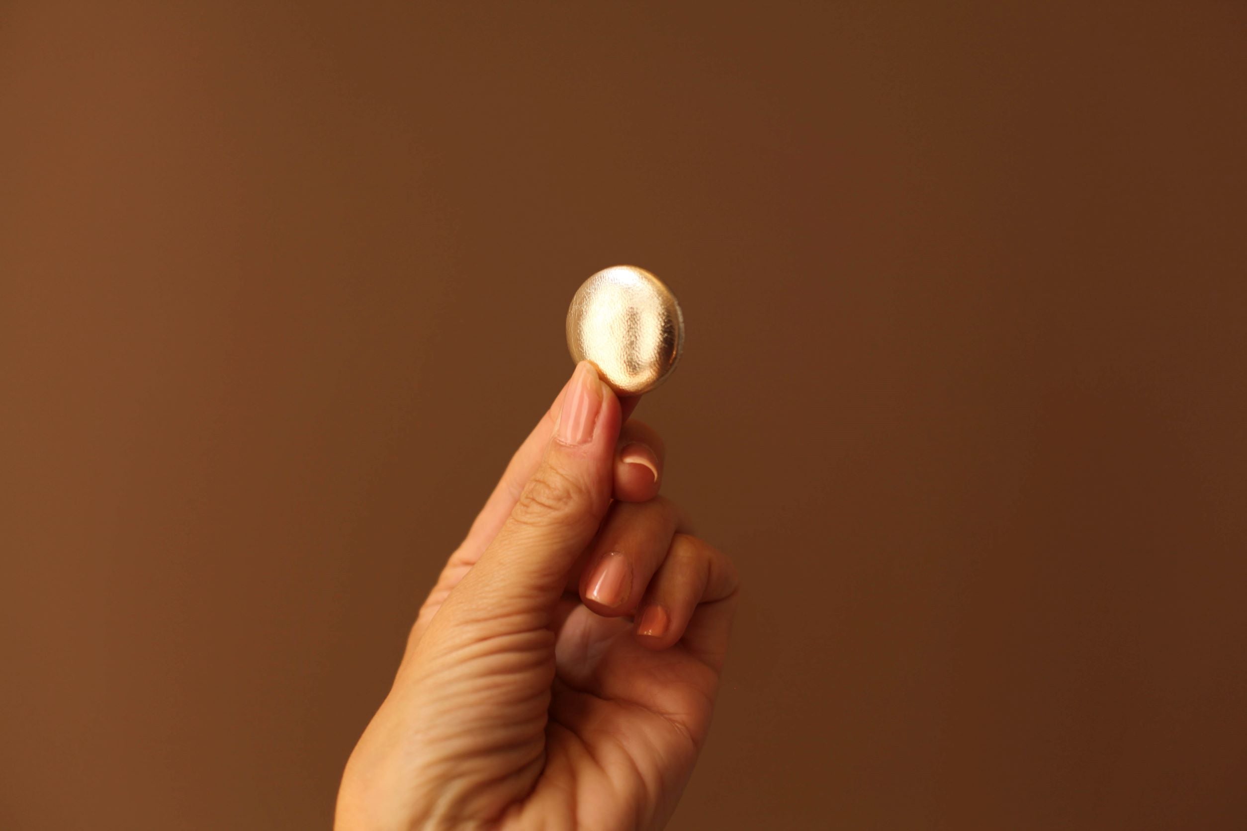 antique gold leather button