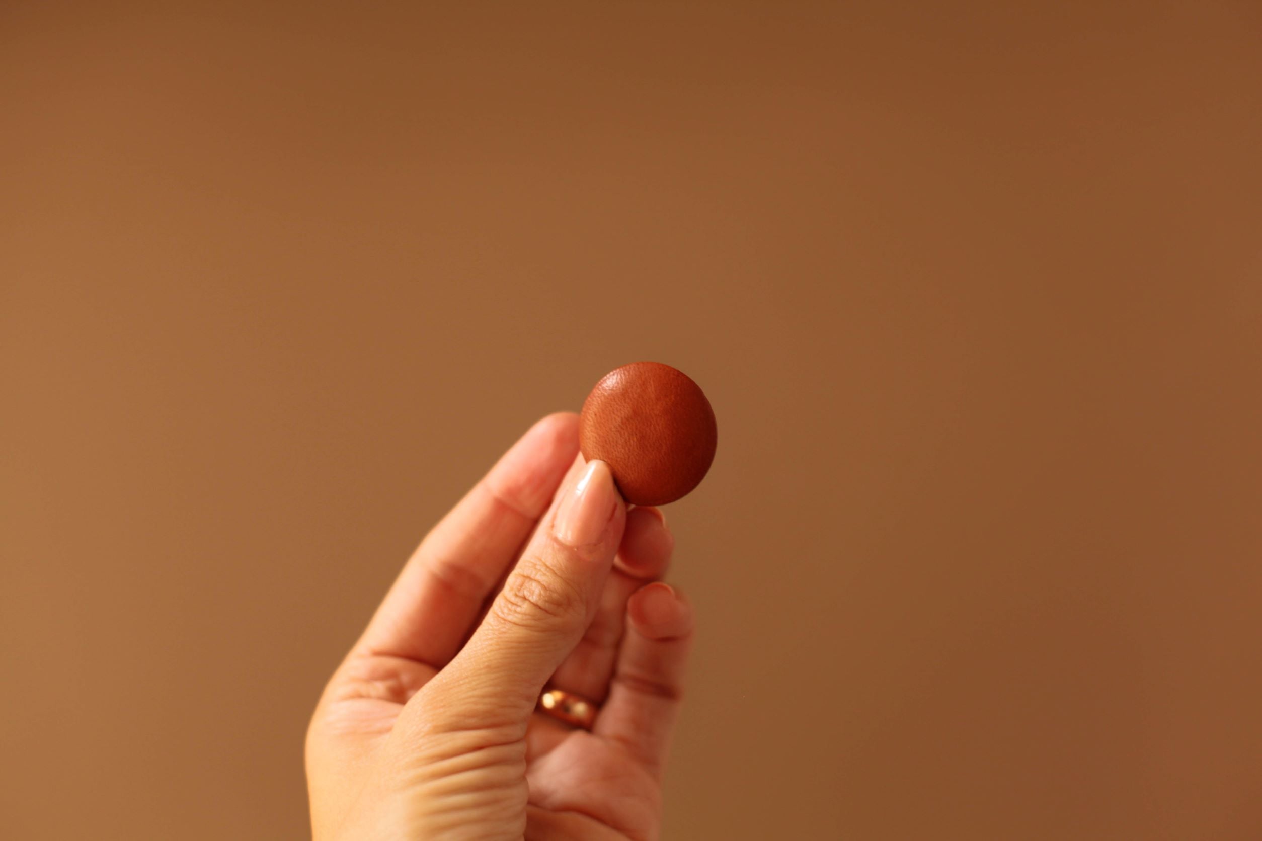 leather button for sports jacket