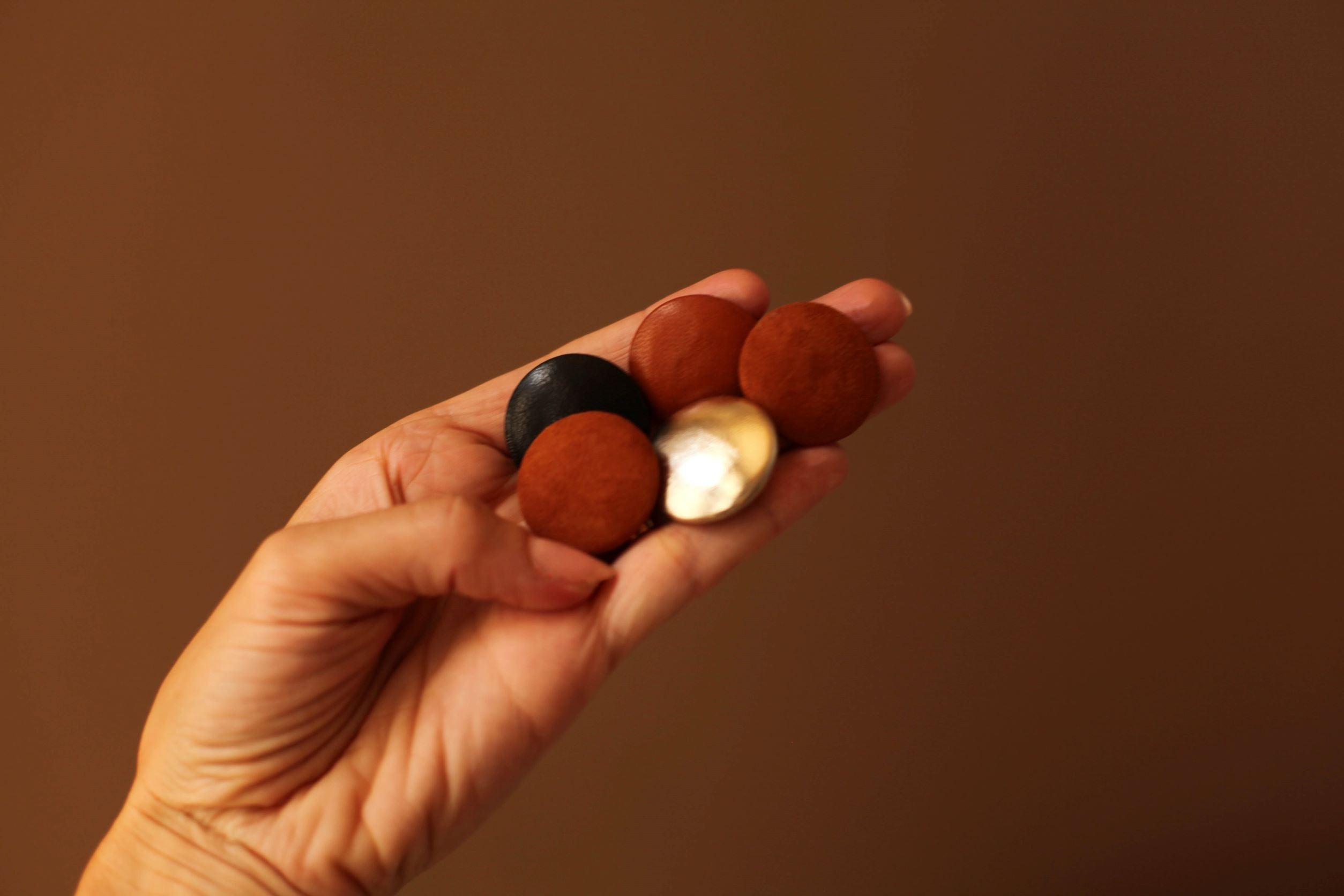 black real leather buttons