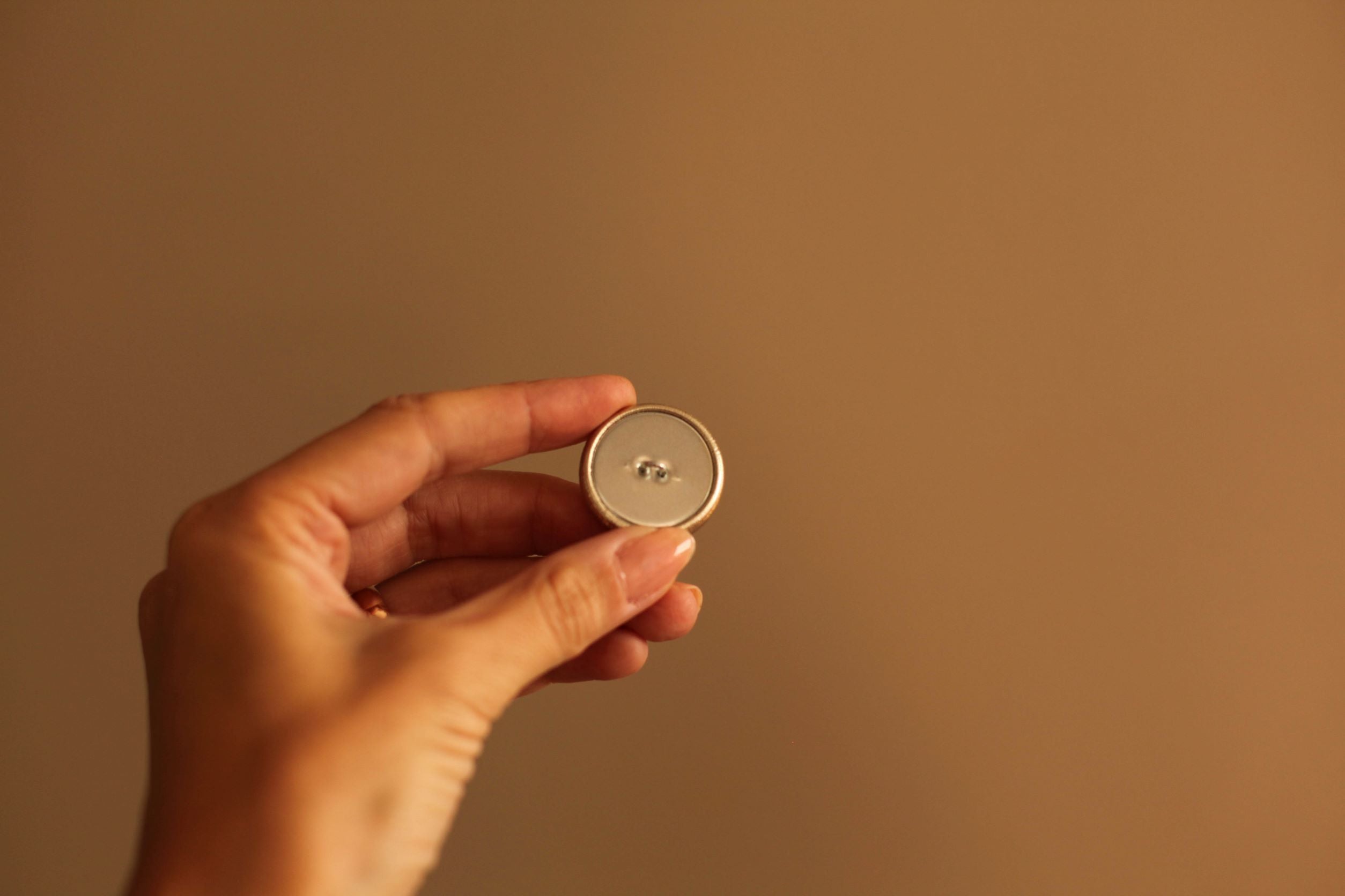 gold leather button with shank