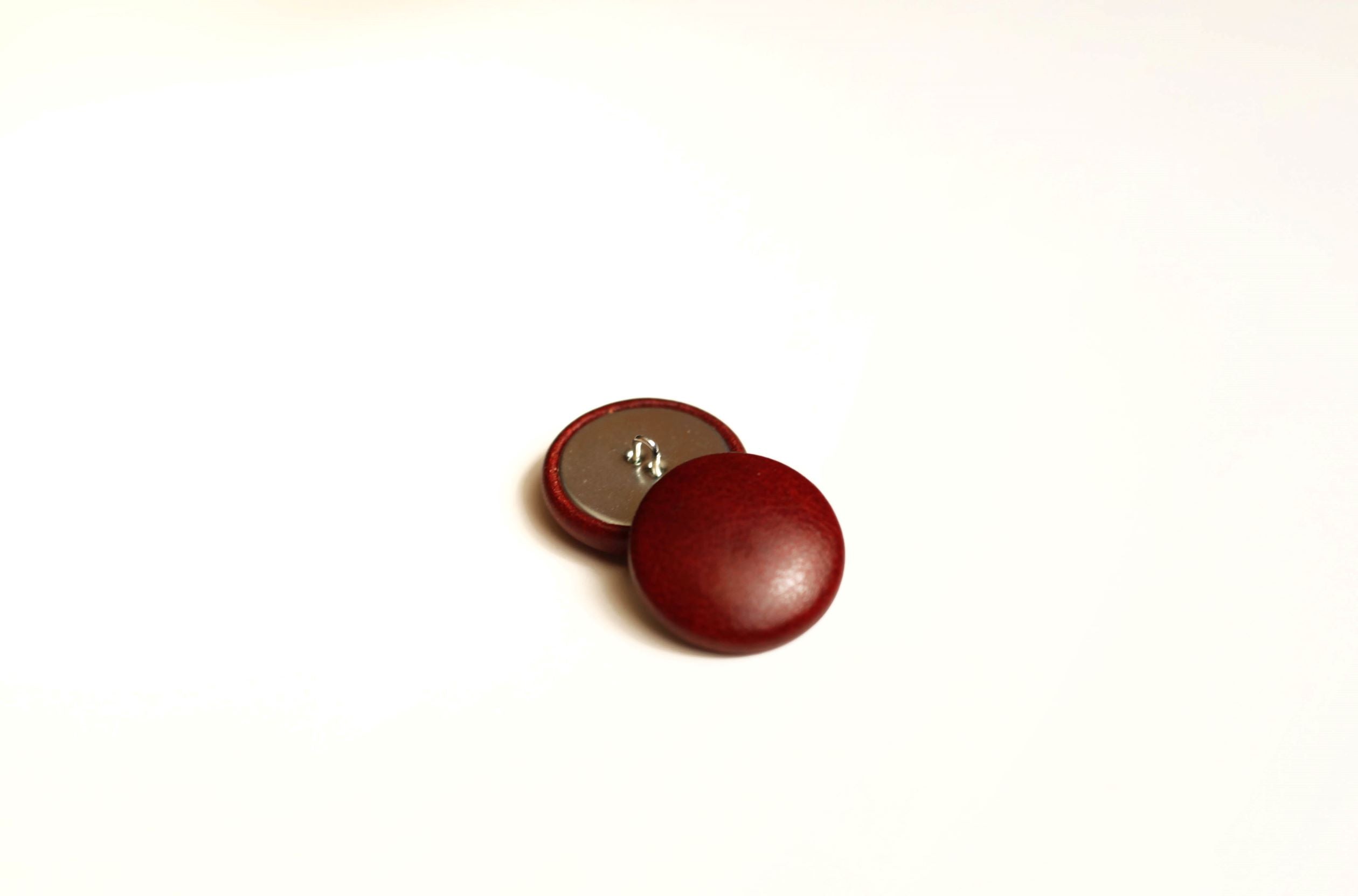 mahogany leather buttons