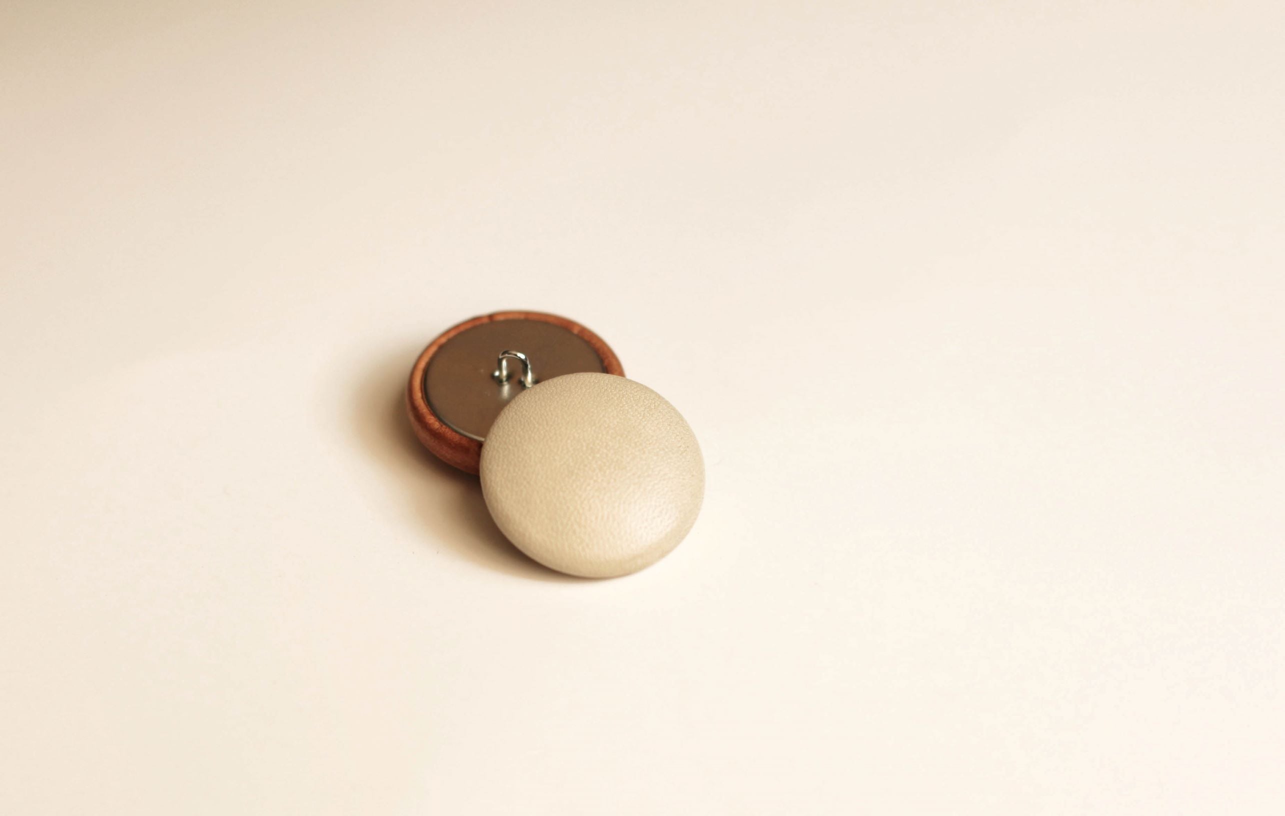 off white leather buttons