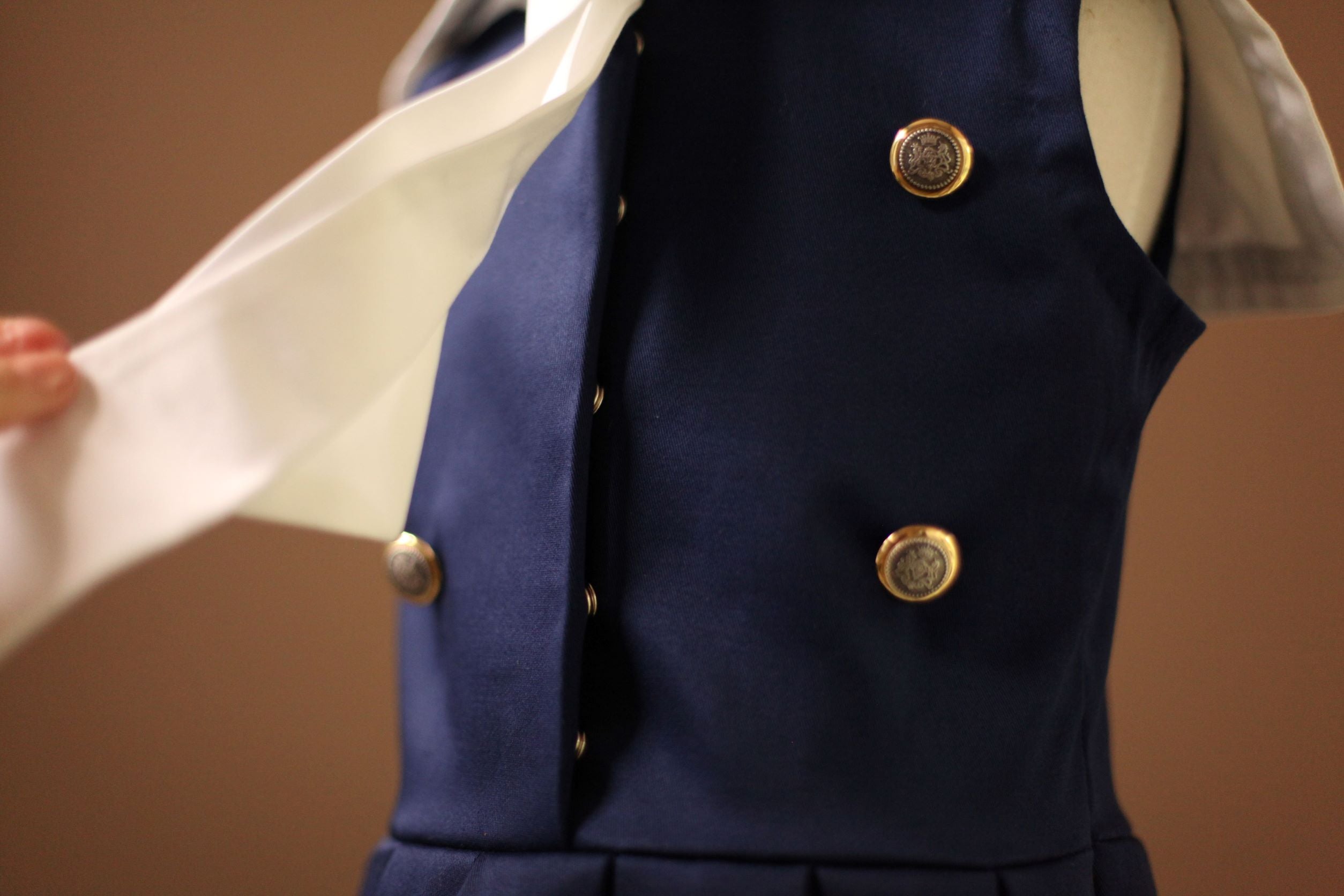 sailor dress with gold buttons
