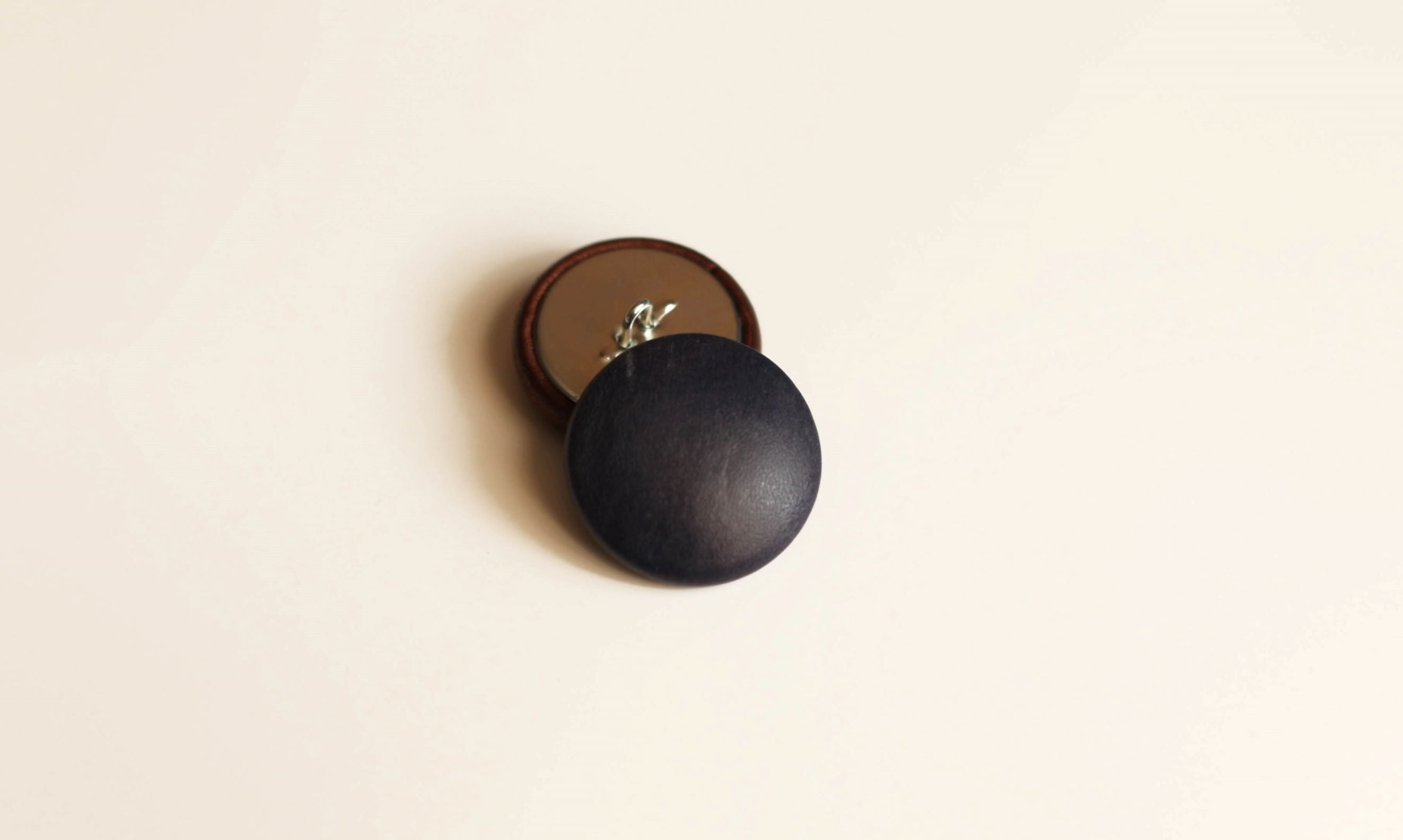 navy blue leather buttons