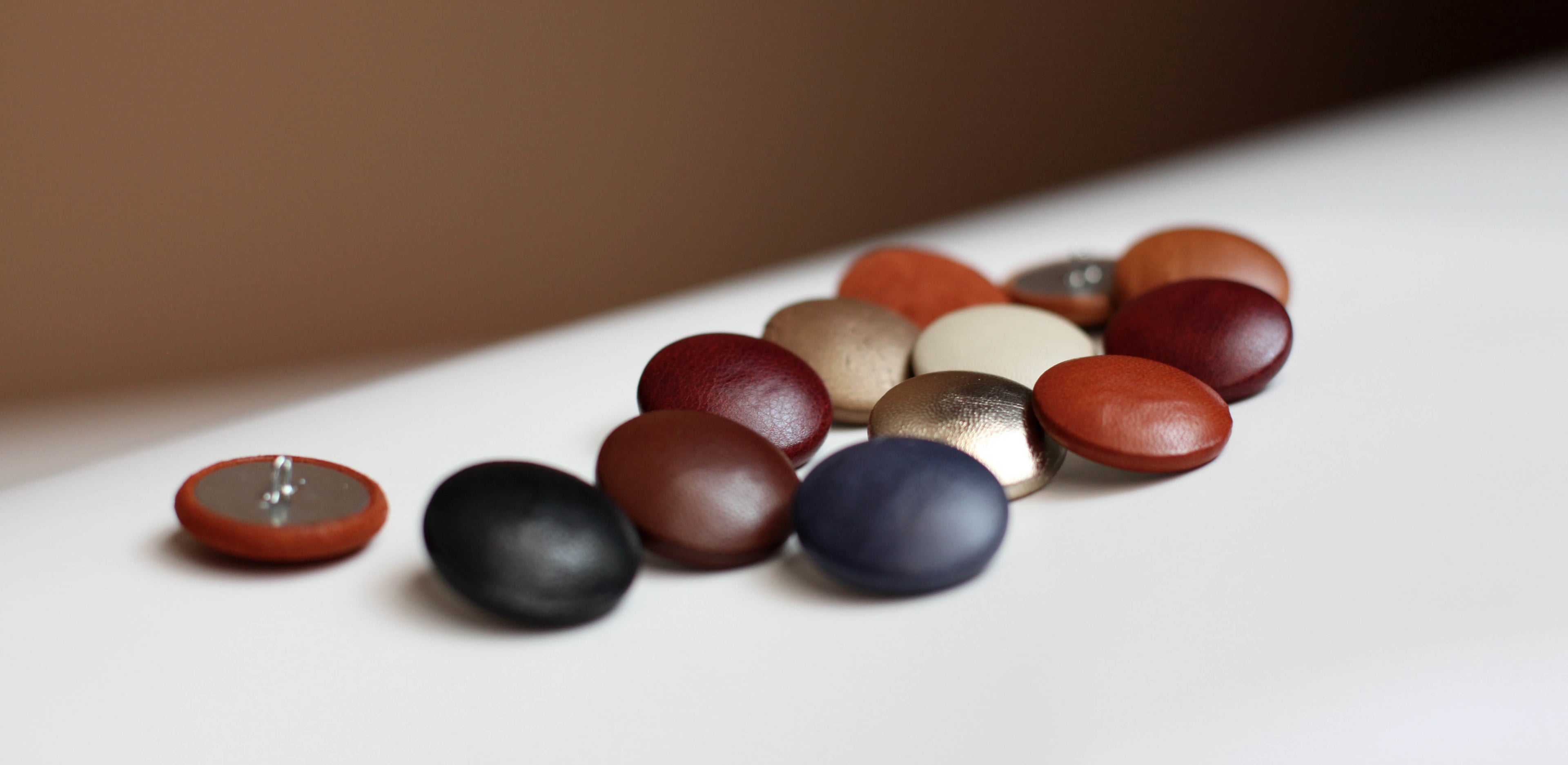 gold eames buttons