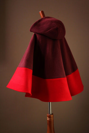 red wool cape with color block