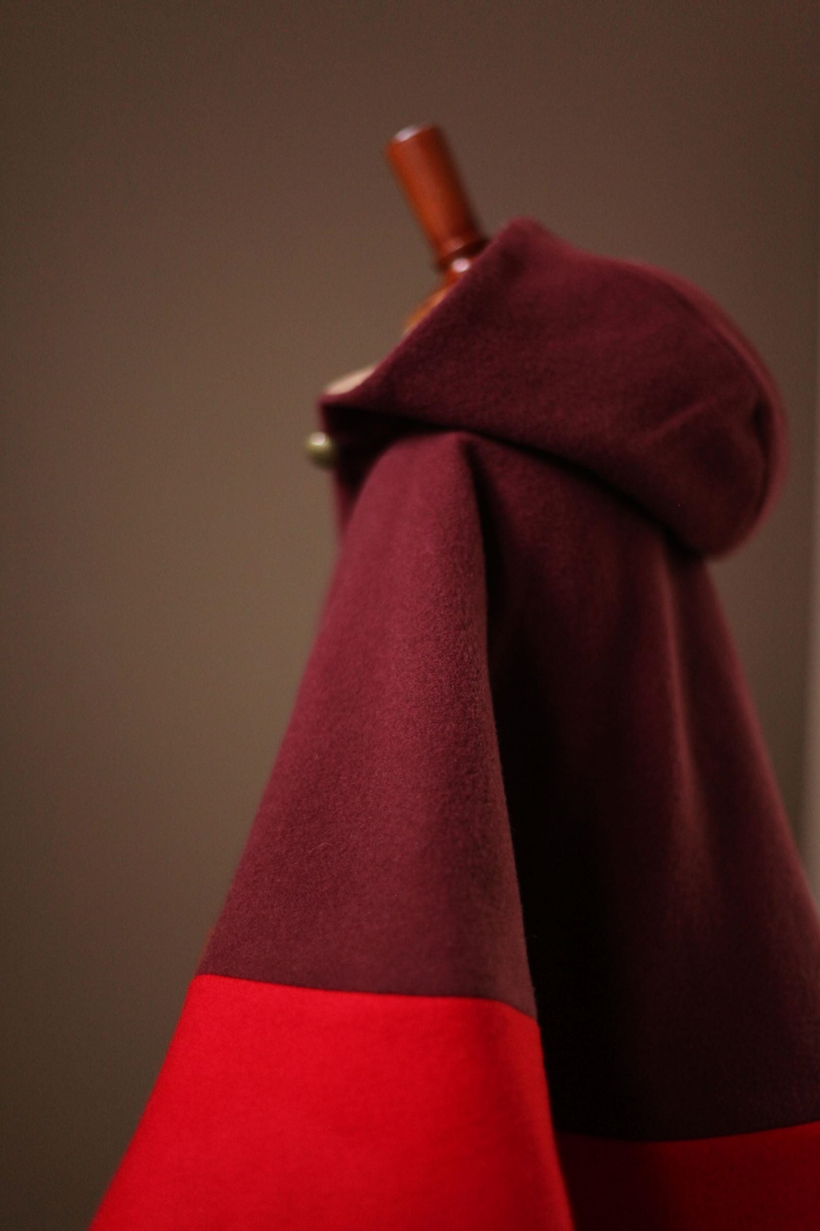 red wool cape with hood