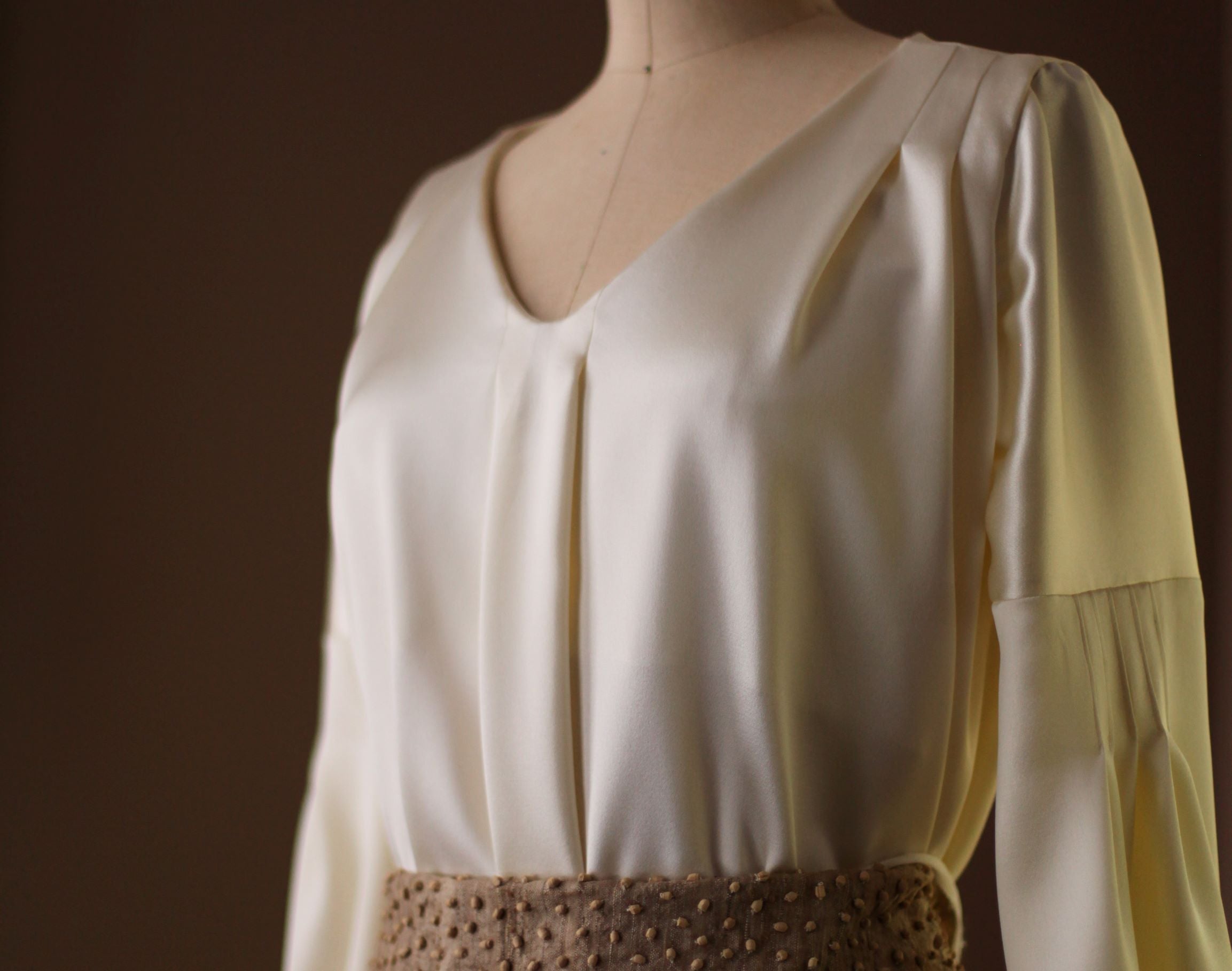 ivory pleated silk blouse