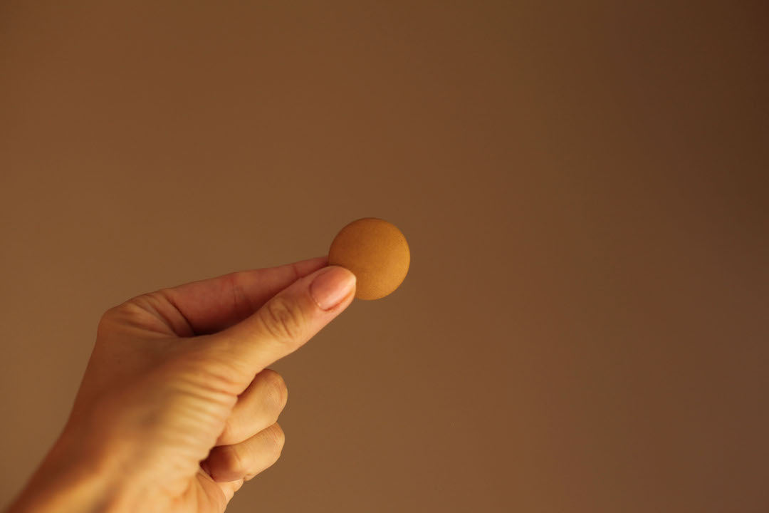 real leather buttons tan